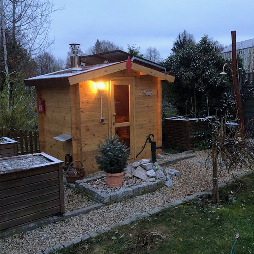 Atmospheric dusk view with lit interior