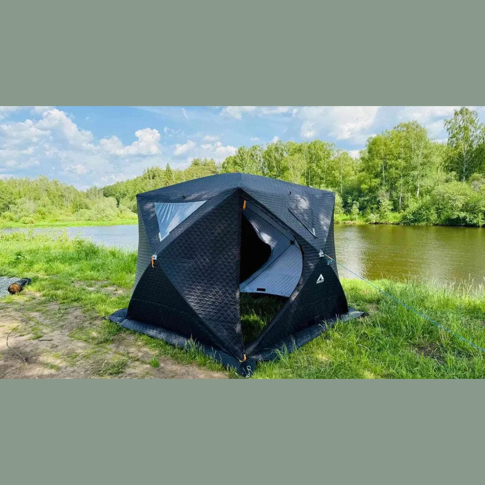 Bastutält Inord Q10 XL MV uppsatt vid en sjö en sommardag